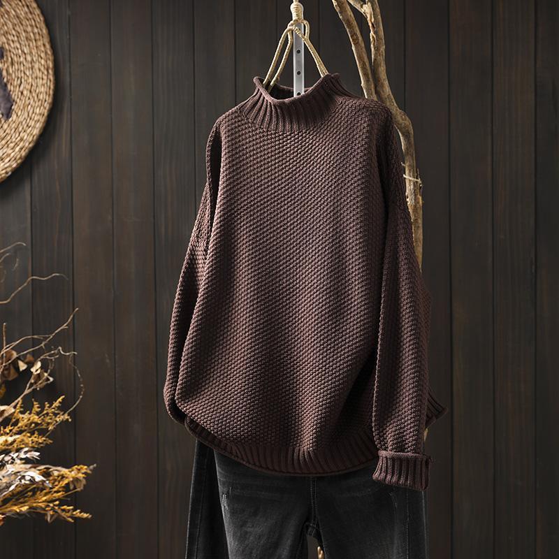 Pull à col roulé en maille tridimensionnelle losanges