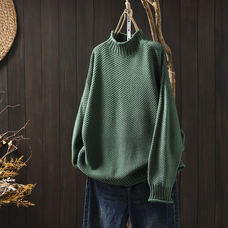 Pull à col roulé en maille tridimensionnelle losanges