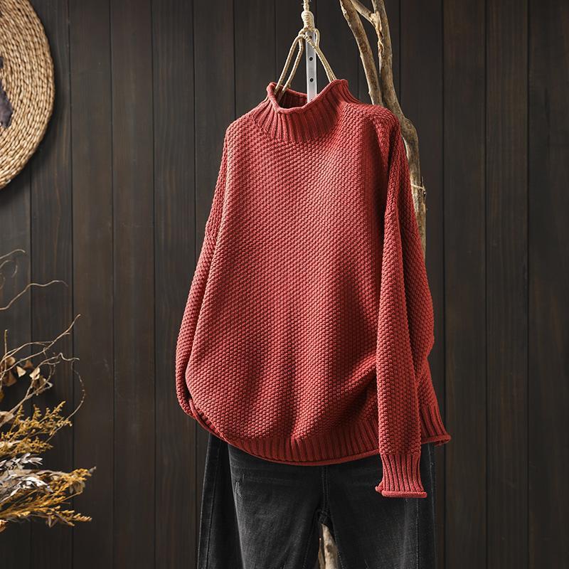 Pull à col roulé en maille tridimensionnelle losanges