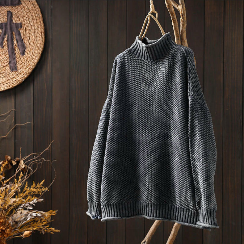 Pull à col roulé en maille tridimensionnelle losanges